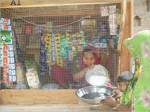 Seema devi selling to a woman with a child